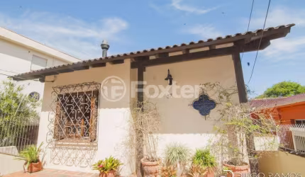 Casa com 3 quartos à venda na Rua General Oliveira Freitas, 57, Santa Tereza, Porto Alegre, 300 m2 por R$ 1.000.000