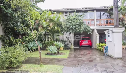 Casa em condomínio fechado com 3 quartos à venda na Avenida Eduardo Prado, 2050, Ipanema, Porto Alegre, 233 m2 por R$ 1.080.000