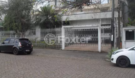 Casa com 4 quartos à venda na Rua Catamarca, 195, Jardim Lindóia, Porto Alegre, 390 m2 por R$ 1.900.000