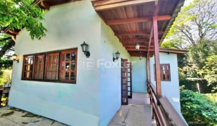 Casa com 4 quartos à venda na Rua Monte Claro, 74, Hípica, Porto Alegre, 176 m2 por R$ 399.000