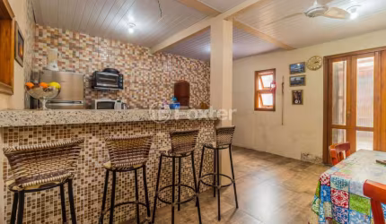 Casa com 5 quartos à venda na Rua Delmar Kuhn, 75, Hípica, Porto Alegre, 135 m2 por R$ 360.000