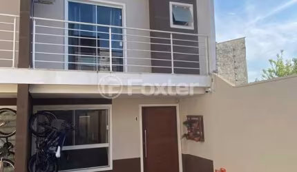 Casa em condomínio fechado com 3 quartos à venda na Rua Antônio Lourenço Rosa, 225, Mato Grande, Canoas, 94 m2 por R$ 405.000