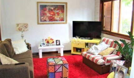 Casa com 3 quartos à venda na Rua Ítalo Brutto, 130, Espírito Santo, Porto Alegre, 180 m2 por R$ 745.000
