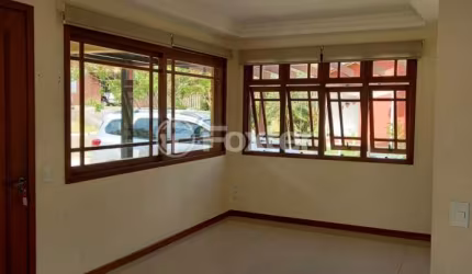 Casa em condomínio fechado com 4 quartos à venda na Rua dos Cardeais, 187, Tarumã, Viamão, 177 m2 por R$ 890.000