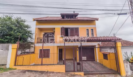 Casa com 4 quartos à venda na Travessa Clemêncio Wallau, 24, Coronel Aparício Borges, Porto Alegre, 484 m2 por R$ 780.000