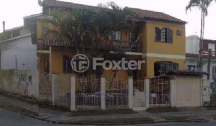 Casa com 3 quartos à venda na Avenida Celestino Bertolucci, 115, Aberta dos Morros, Porto Alegre, 306 m2 por R$ 979.900