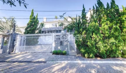 Casa com 3 quartos à venda na Rua Alcebíades Antônio dos Santos, 550, Nonoai, Porto Alegre, 399 m2 por R$ 1.790.000