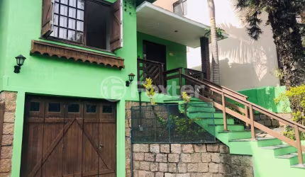 Casa com 4 quartos à venda na Rua Cangussu, 58, Nonoai, Porto Alegre, 184 m2 por R$ 560.500