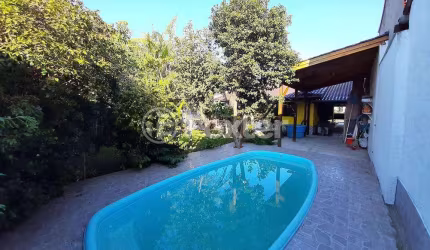 Casa com 4 quartos à venda na Rua Osvaldo Aranha, 236, Formoza, Alvorada, 177 m2 por R$ 400.000