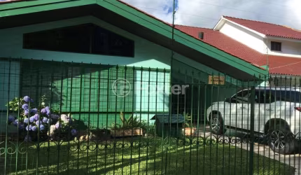 Casa com 4 quartos à venda na Rua Mura, 50, Guarujá, Porto Alegre, 165 m2 por R$ 750.000