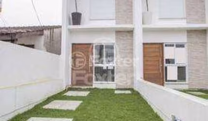 Casa com 2 quartos à venda na Rua Raffaele Nigro, 109, Hípica, Porto Alegre, 88 m2 por R$ 425.000