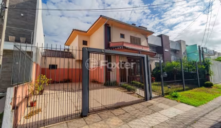 Casa em condomínio fechado com 5 quartos à venda na Rua Eroni Soares Machado, 104, Hípica, Porto Alegre, 234 m2 por R$ 1.100.000
