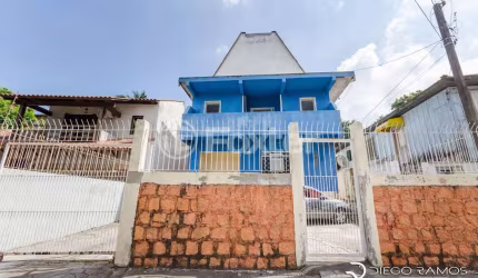Casa comercial com 1 sala à venda na Rua Octávio de Souza, 995, Nonoai, Porto Alegre, 279 m2 por R$ 510.000
