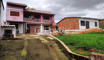 Casa com 3 quartos à venda na Avenida Garcia Lorca, 94, Parque Santo Inácio, Esteio, 151 m2 por R$ 340.000