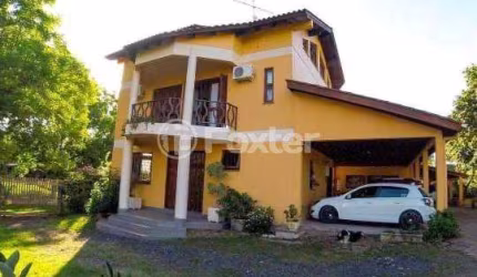 Casa com 4 quartos à venda na Avenida Do Passito, 1140, California, Nova Santa Rita, 425 m2 por R$ 902.500