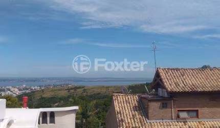 Casa com 3 quartos à venda na Rua Dona Lida Monteiro, 215, Teresópolis, Porto Alegre, 309 m2 por R$ 755.000