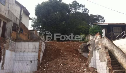 Terreno comercial à venda na Avenida Vicente Monteggia, 564, Cavalhada, Porto Alegre, 620 m2 por R$ 250.000