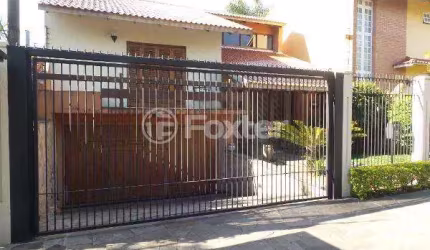 Casa com 3 quartos à venda na Rua Doutor Mário Totta, 1440, Tristeza, Porto Alegre, 287 m2 por R$ 1.250.000