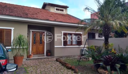 Casa com 3 quartos à venda na Rua Jayme Saul de Borba, 40, Guarujá, Porto Alegre, 157 m2 por R$ 650.000