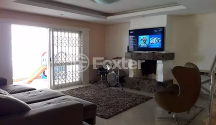 Casa com 4 quartos à venda na Avenida Fábio Araújo Santos, 1128, Nonoai, Porto Alegre, 325 m2 por R$ 1.680.000