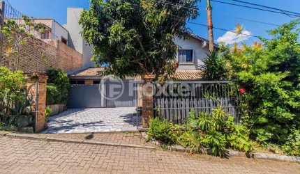 Casa em condomínio fechado com 3 quartos à venda na Estrada João Passuelo, 1060, Vila Nova, Porto Alegre, 192 m2 por R$ 720.000