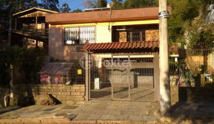 Casa com 2 quartos à venda na Rua Podalírio João da Rocha, 56, Jardim Carvalho, Porto Alegre, 118 m2 por R$ 450.000