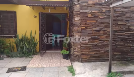 Casa com 3 quartos à venda na Rua Vicente Cláudio Porcello, 60, Harmonia, Canoas, 150 m2 por R$ 800.000