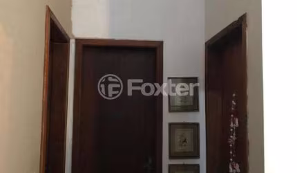 Casa com 3 quartos à venda na Rua Criciúma, 357, Guarujá, Porto Alegre, 147 m2 por R$ 590.000