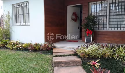 Casa com 4 quartos à venda na Rua Dezessete de Junho, 2126, Morro do Leôncio, Taquara, 158 m2 por R$ 1.099.000