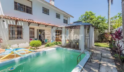 Casa com 4 quartos à venda na Rua Doutor Raul Moreira, 354, Cristal, Porto Alegre, 180 m2 por R$ 950.000