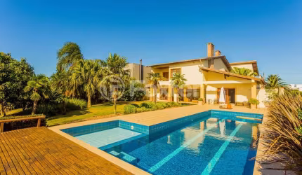 Casa em condomínio fechado com 5 quartos à venda na Avenida Juca Batista, 8000, Belém Novo, Porto Alegre, 600 m2 por R$ 3.450.000