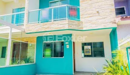 Casa em condomínio fechado com 3 quartos à venda na Rua Angico, 114, Hípica, Porto Alegre, 178 m2 por R$ 597.550