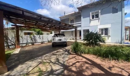 Casa com 3 quartos à venda na Rua Vítor Scalco, 160, Centro, Guaíba, 145 m2 por R$ 830.000