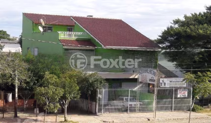 Casa com 4 quartos à venda na Rua Rubem Pereira Torelly, 2439, Restinga, Porto Alegre, 406 m2 por R$ 430.000