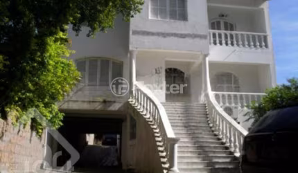 Casa com 4 quartos à venda na Rua Barão de Bagé, 878, Vila Jardim, Porto Alegre, 450 m2 por R$ 1.850.000