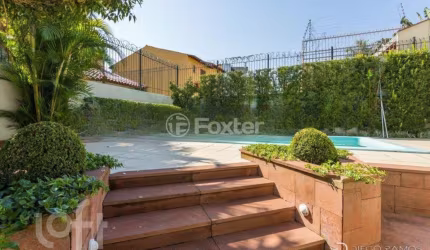 Casa com 4 quartos à venda na Rua Walir Zottis, 550, Jardim Itu Sabará, Porto Alegre, 293 m2 por R$ 1.070.000