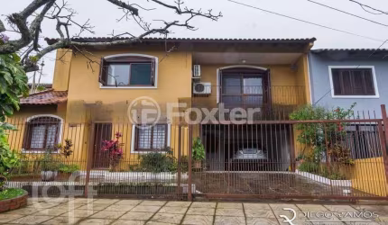 Casa com 6 quartos à venda na Rua André Primo Biazetto, 6, Campo Novo, Porto Alegre, 330 m2 por R$ 1.100.000