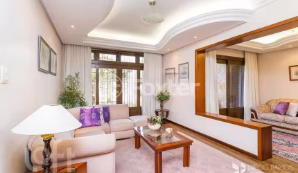 Casa com 4 quartos à venda na Rua Guadalajara, 85, Jardim Itu Sabará, Porto Alegre, 296 m2 por R$ 1.100.000