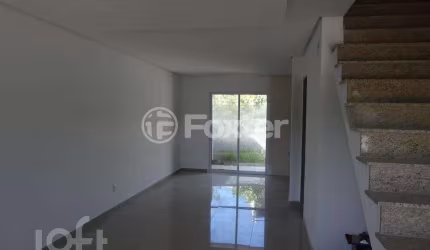 Casa com 3 quartos à venda na Rua Vanderlei da Silva Alves, 470, Mário Quintana, Porto Alegre, 107 m2 por R$ 550.000