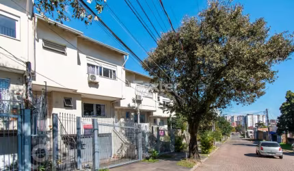 Casa com 3 quartos à venda na Rua Vitório Francisco Giordani, 320, Jardim Itu Sabará, Porto Alegre, 171 m2 por R$ 620.000