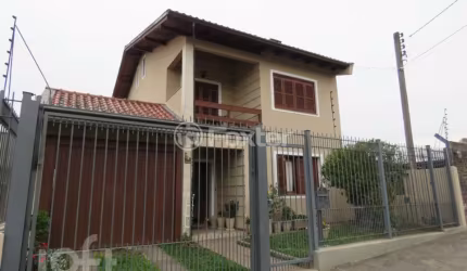 Casa com 3 quartos à venda na Rua Vladimir Herzog, 176, Jardim Carvalho, Porto Alegre, 300 m2 por R$ 700.000