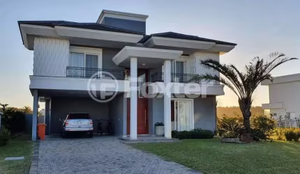 Casa em condomínio fechado com 4 quartos à venda na Avenida Paraguassu, 1570, Centro, Capão da Canoa, 470 m2 por R$ 2.541.250