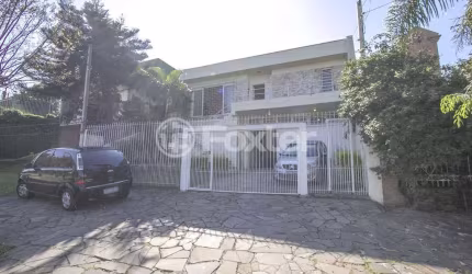 Casa comercial com 2 salas à venda na Rua Professor Ulisses Cabral, 341, Chácara das Pedras, Porto Alegre, 254 m2 por R$ 1.190.000