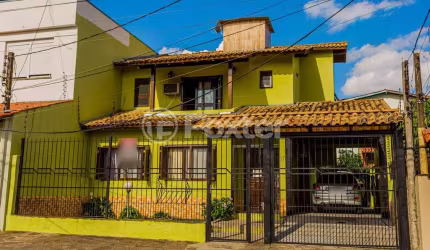 Casa com 3 quartos à venda na Avenida Doutor Rubem Knijnik, 87, Parque Santa Fé, Porto Alegre, 239 m2 por R$ 900.000