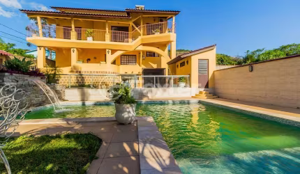 Casa com 4 quartos à venda na Rua Maurílio Ferreira, 320, Campo Novo, Porto Alegre, 320 m2 por R$ 1.850.000