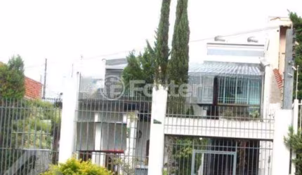 Casa com 3 quartos à venda na Rua Irene Capponi Santiago, 178, Cristo Redentor, Porto Alegre, 298 m2 por R$ 1.420.000
