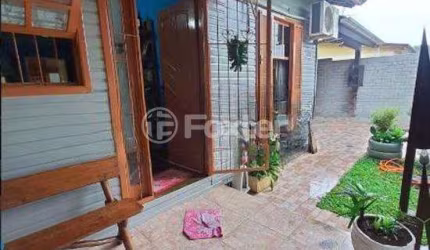 Casa com 2 quartos à venda na Rua Alcides Sabedot, 307, Estância Velha, Canoas, 150 m2 por R$ 340.000