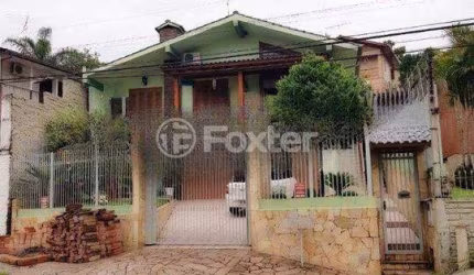 Casa com 3 quartos à venda na Rua Portugal, 484, Rincão, Novo Hamburgo, 182 m2 por R$ 650.000