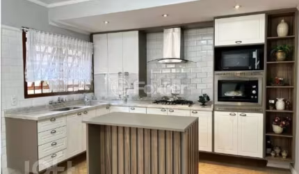 Casa com 3 quartos à venda na Rua Turquia, 18, Marechal Rondon, Canoas, 255 m2 por R$ 1.170.000