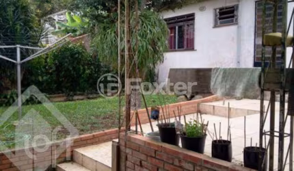 Casa com 5 quartos à venda na Avenida General Barreto Viana, 537, Chácara das Pedras, Porto Alegre, 283 m2 por R$ 950.000